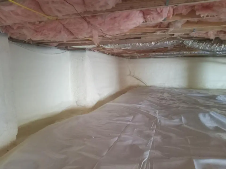 Crawl space encapsulation with closed-cell spray foam for Storm Damage Roof Repair in Grand Blanc